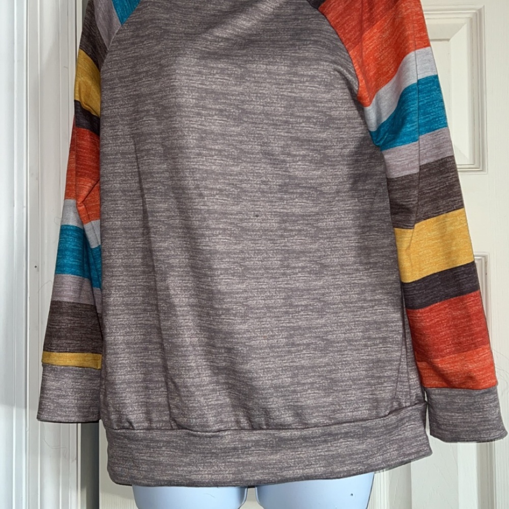 WOMANS BROWN SHIRT WITH MULTI COLOR STRIPED SLEEVES